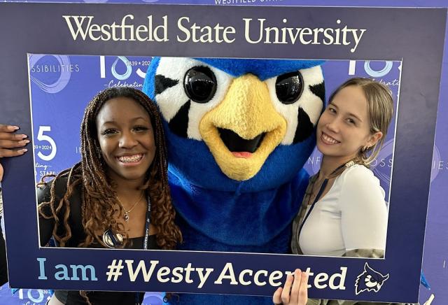 Two students at Accepted Student Day event with Nestor.